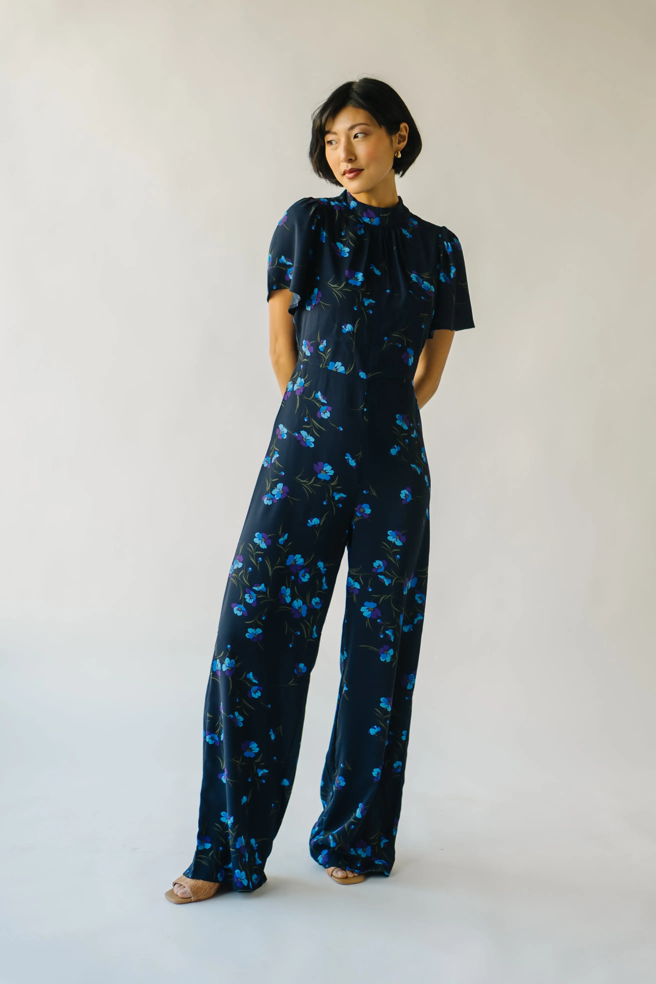 The Seldovia Mock Neck Jumpsuit in Navy   Purple