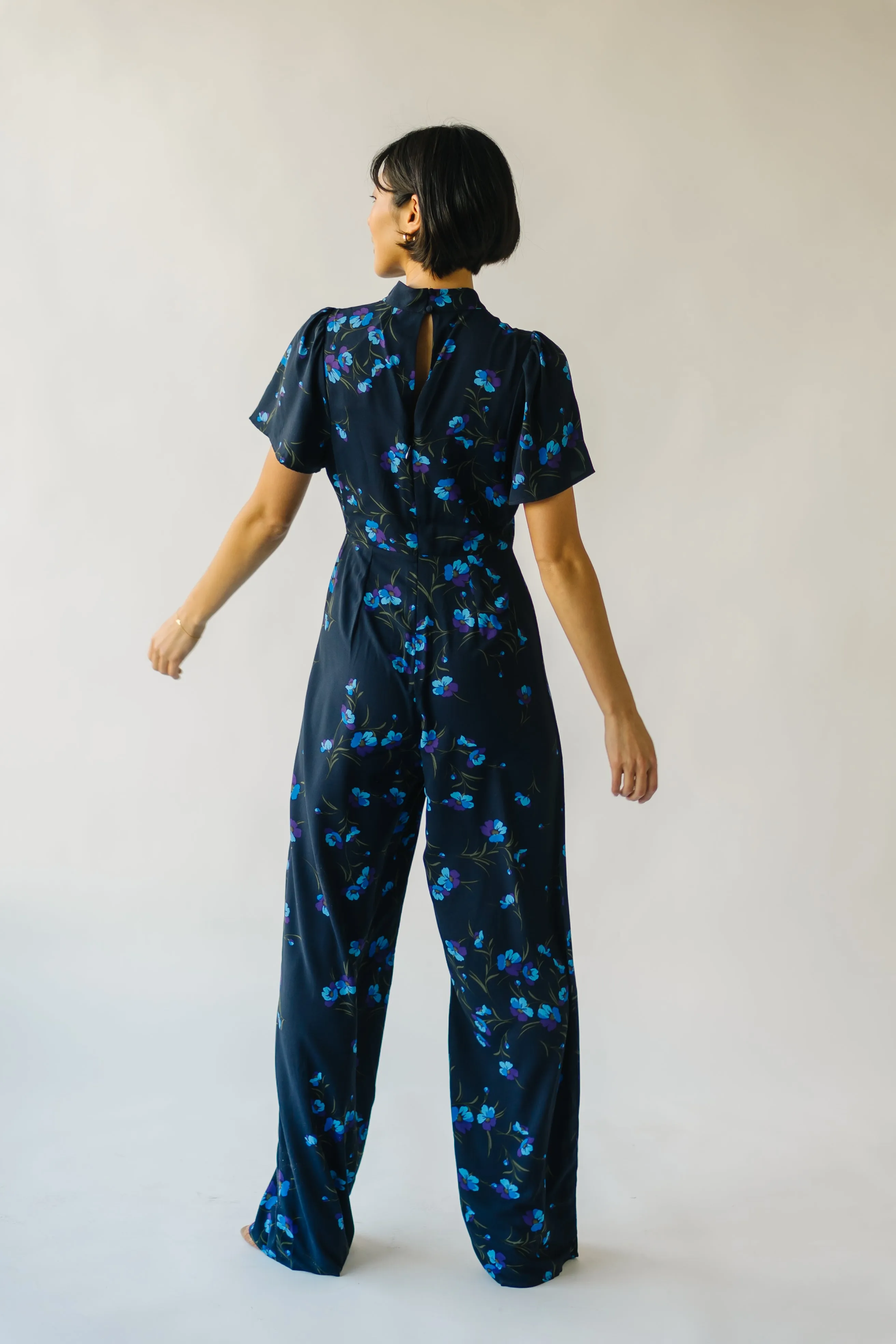 The Seldovia Mock Neck Jumpsuit in Navy   Purple